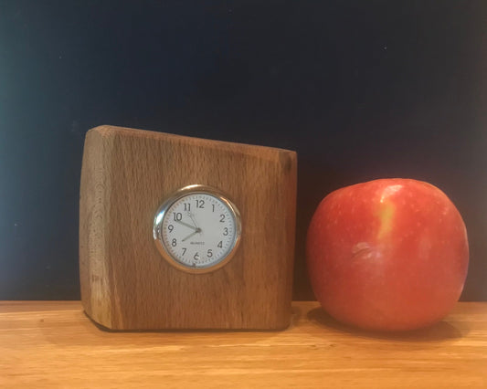 Handmade Miniature Sycamore clock in unique design. There is a choice of 6 different clock face colours
