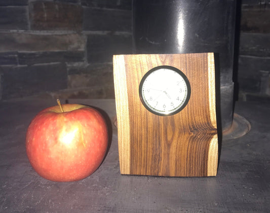 Handmade miniature clock made from laburnum in a unique design. Choice of 8 different clock face colours