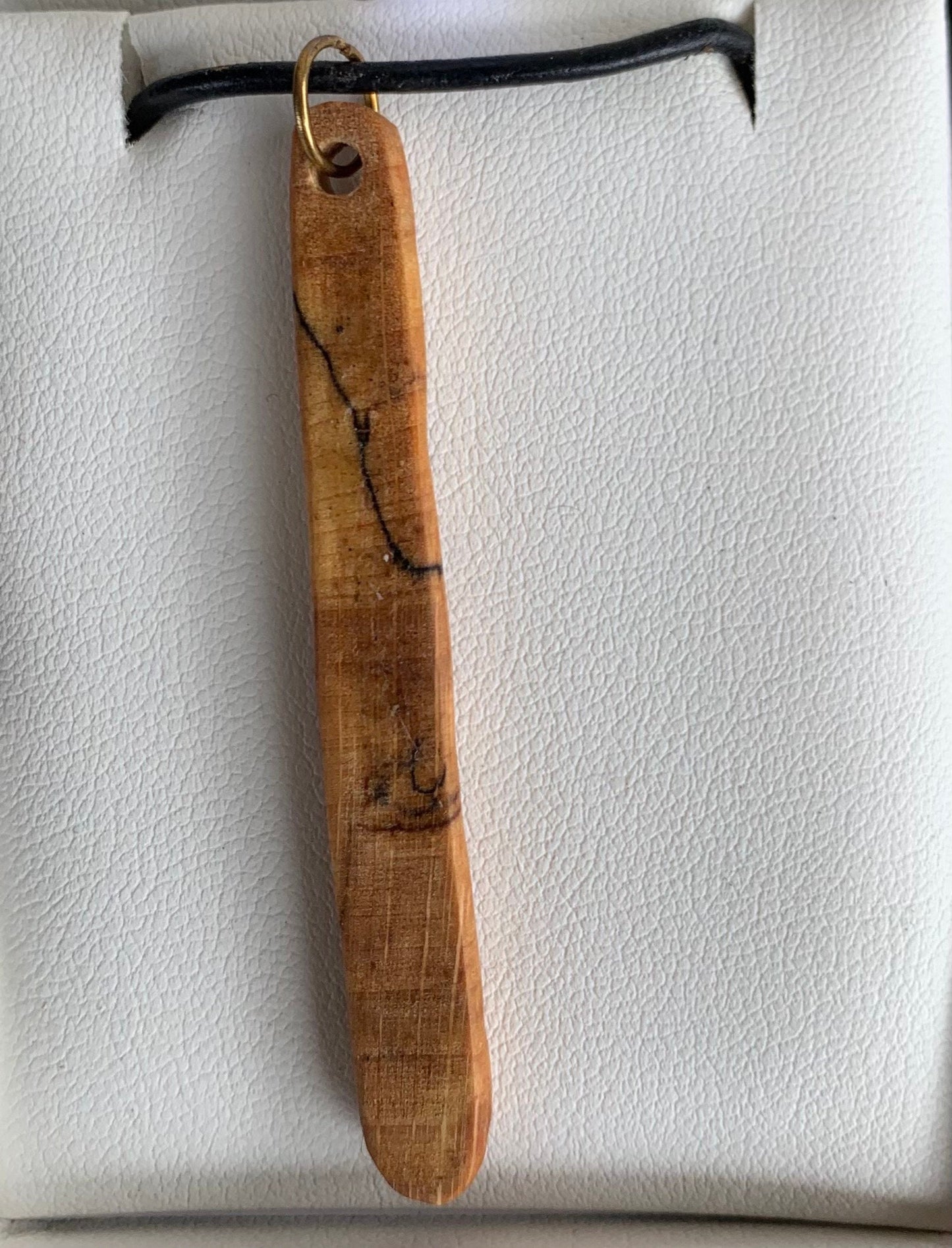 Pendant made from spalted beech on a leather necklace